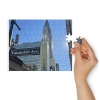 Jigsaw puzzle with tin